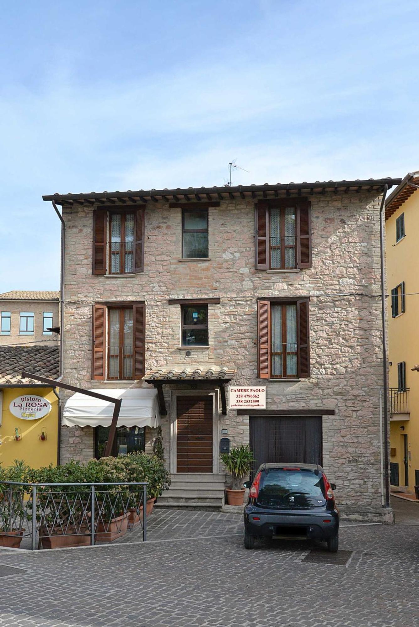 Camere Paolo Assisi Luaran gambar